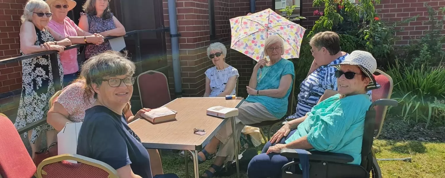 Book club taking advantage of the sunshine
